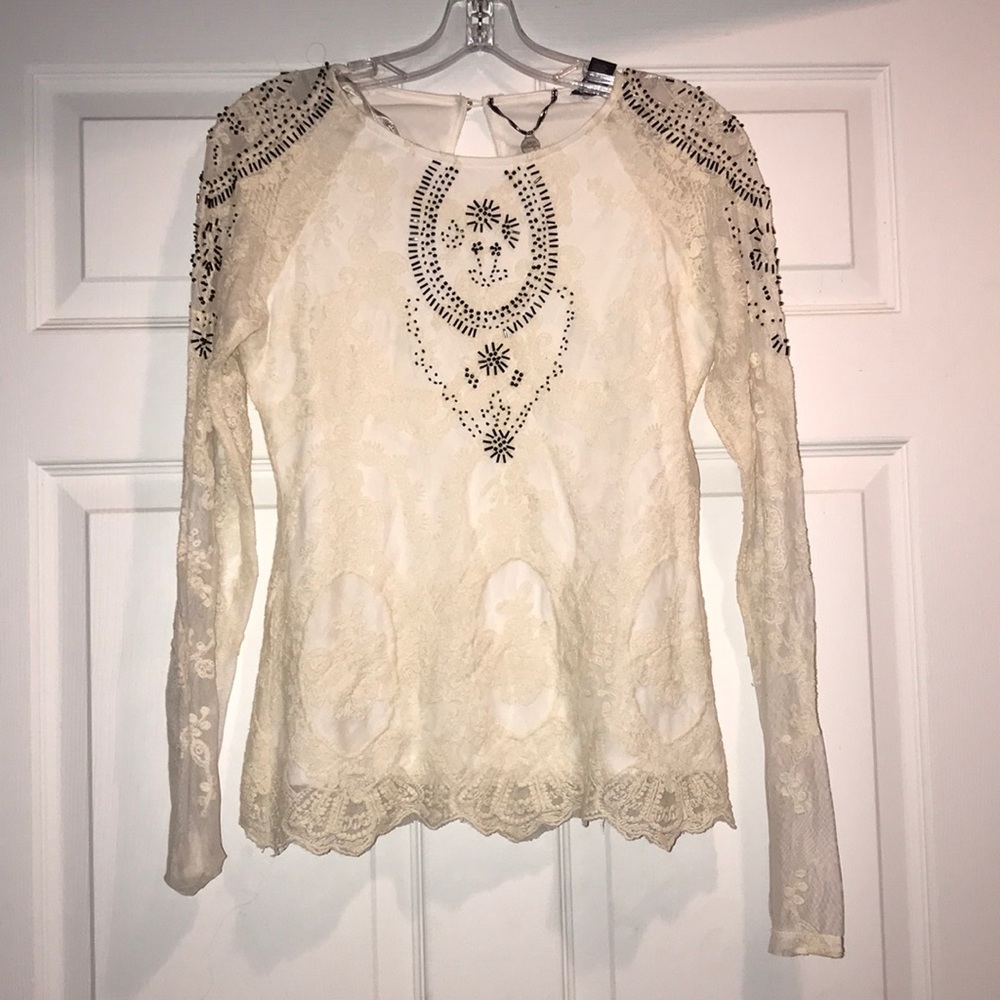 BKE beaded long sleeve blouse.
